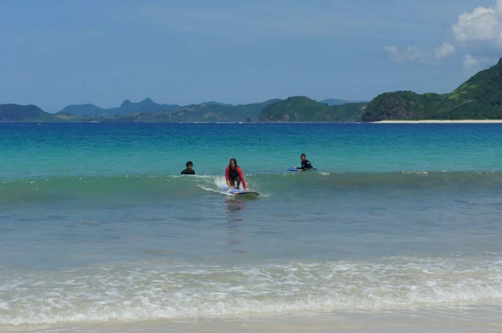 surfers in Lombok