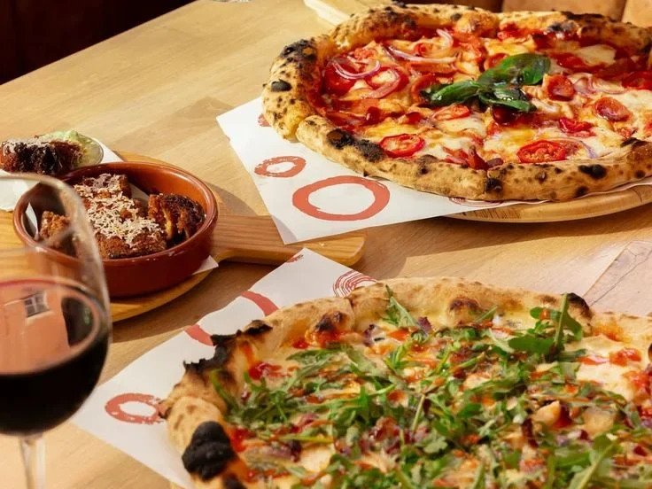 Wood-fired pizza and food at a cafe in Kuta Lombok