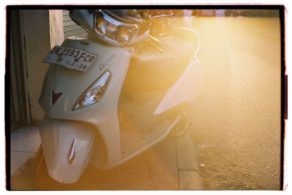 Renting a scooter in Lombok parked on a quiet street